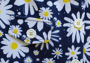 FALDA NIÑA ESTAMPACIÓN MARGARITAS