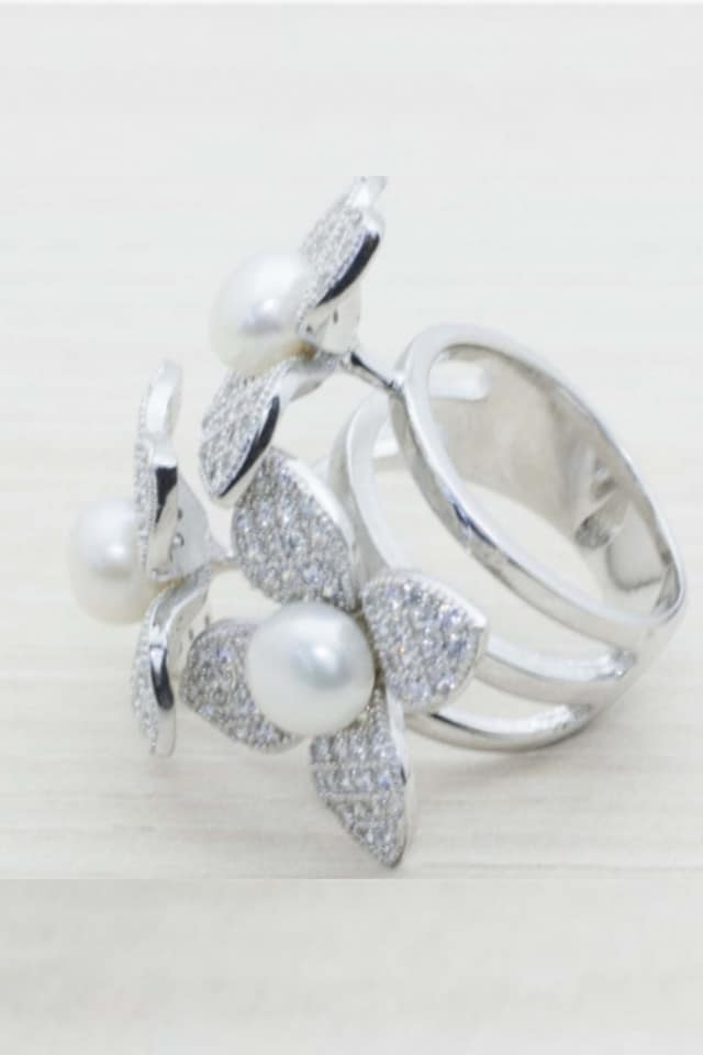 ANILLO TRES FLORES PLATA