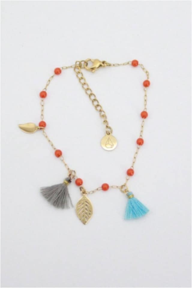 Pulsera mujr acero dorado pompones